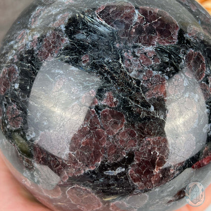 101mm Polished Arfvedsonite and Garnet Firework Sphere