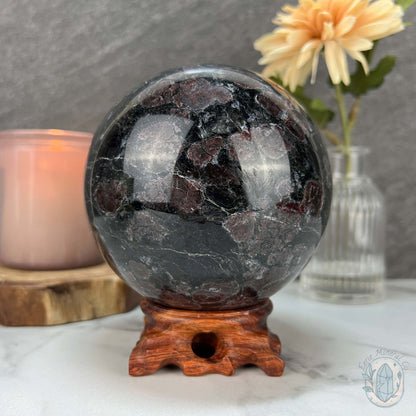 101mm Polished Arfvedsonite and Garnet Firework Sphere