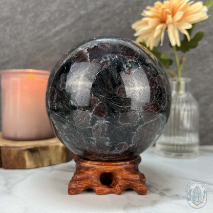 101mm Polished Arfvedsonite and Garnet Firework Sphere