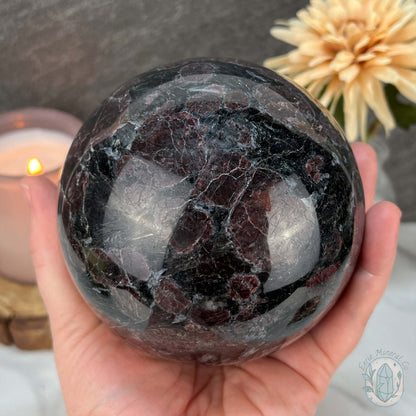 101mm Polished Arfvedsonite and Garnet Firework Sphere