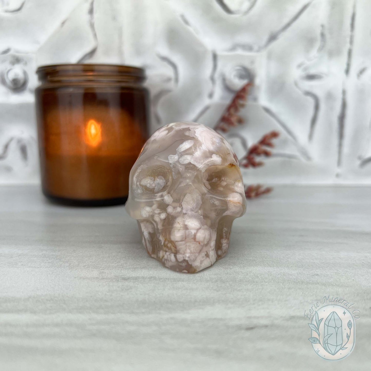 Polished Flower Agate Skull Carving