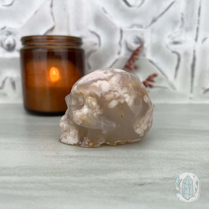 Polished Flower Agate Skull Carving
