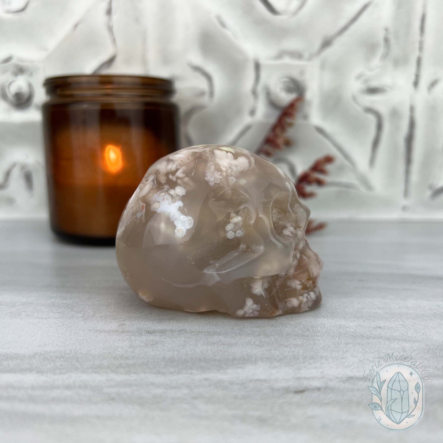 Polished Flower Agate Skull Carving