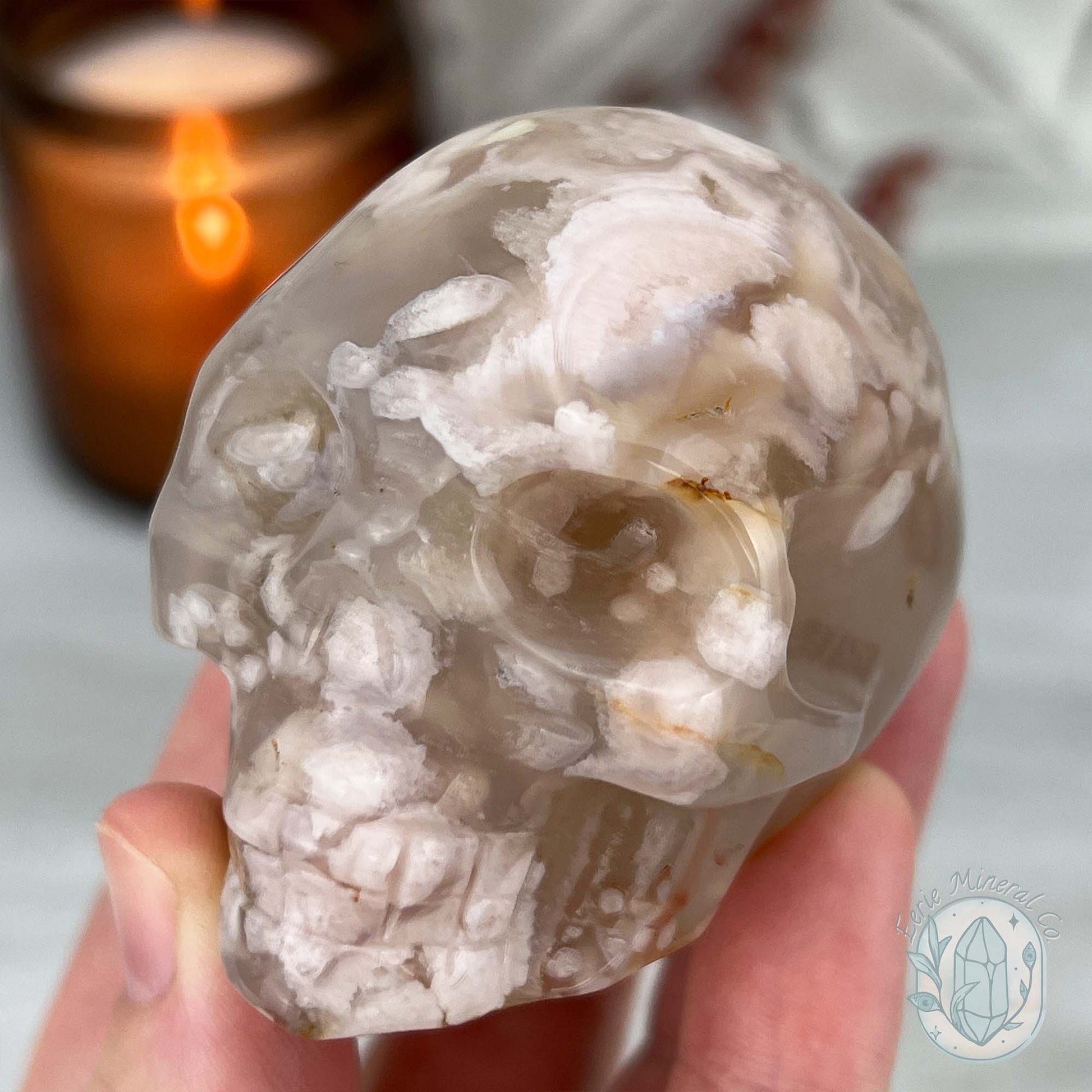 Polished Flower Agate Skull Carving