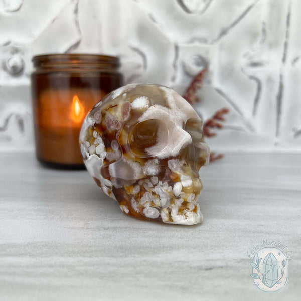 Polished Flower Agate Skull Carving