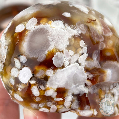Polished Flower Agate Skull Carving