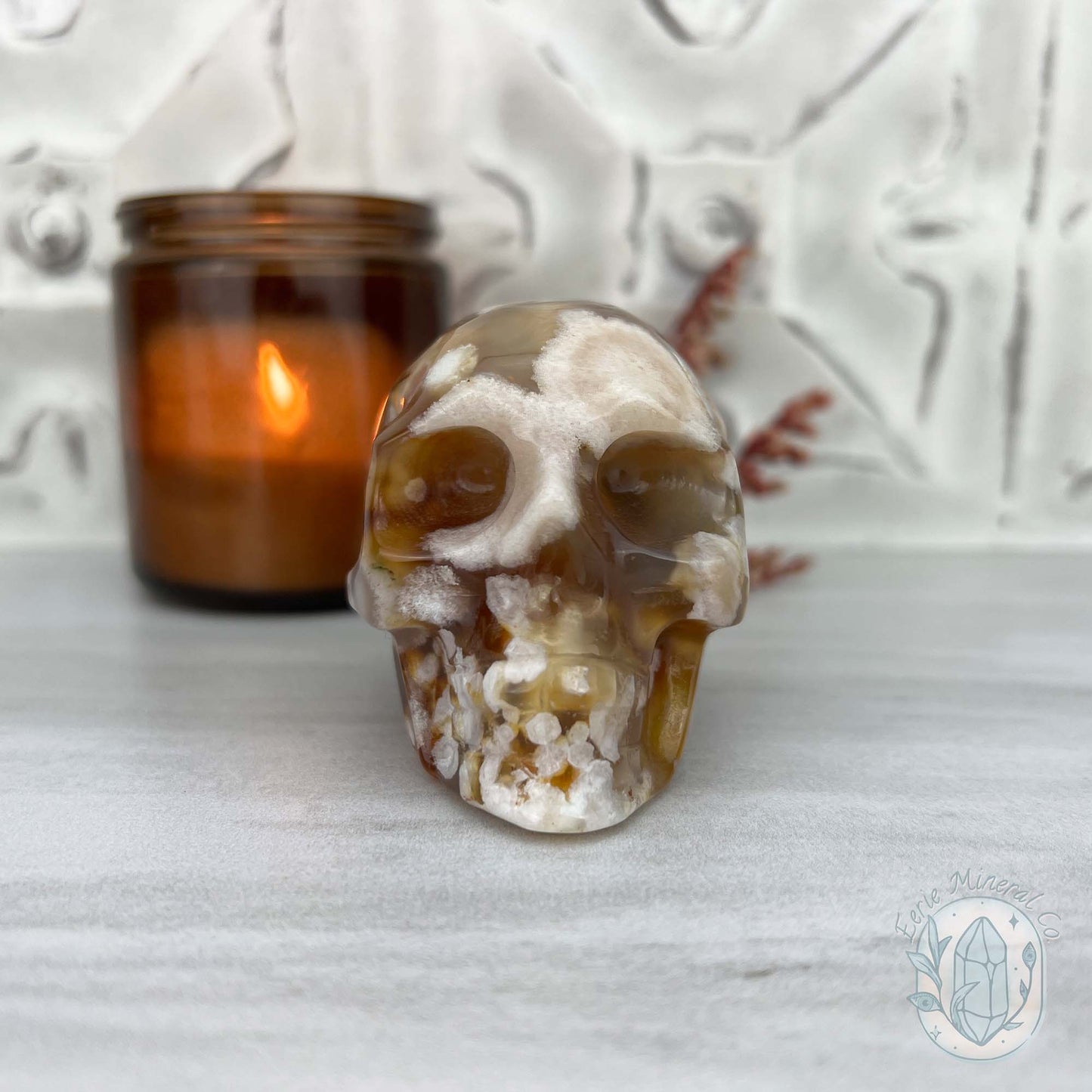 Polished Flower Agate Skull Carving