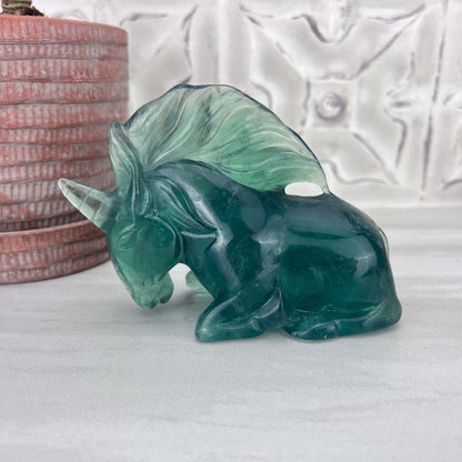 Polished Green Fluorite Unicorn Carving with Natural Wood Base