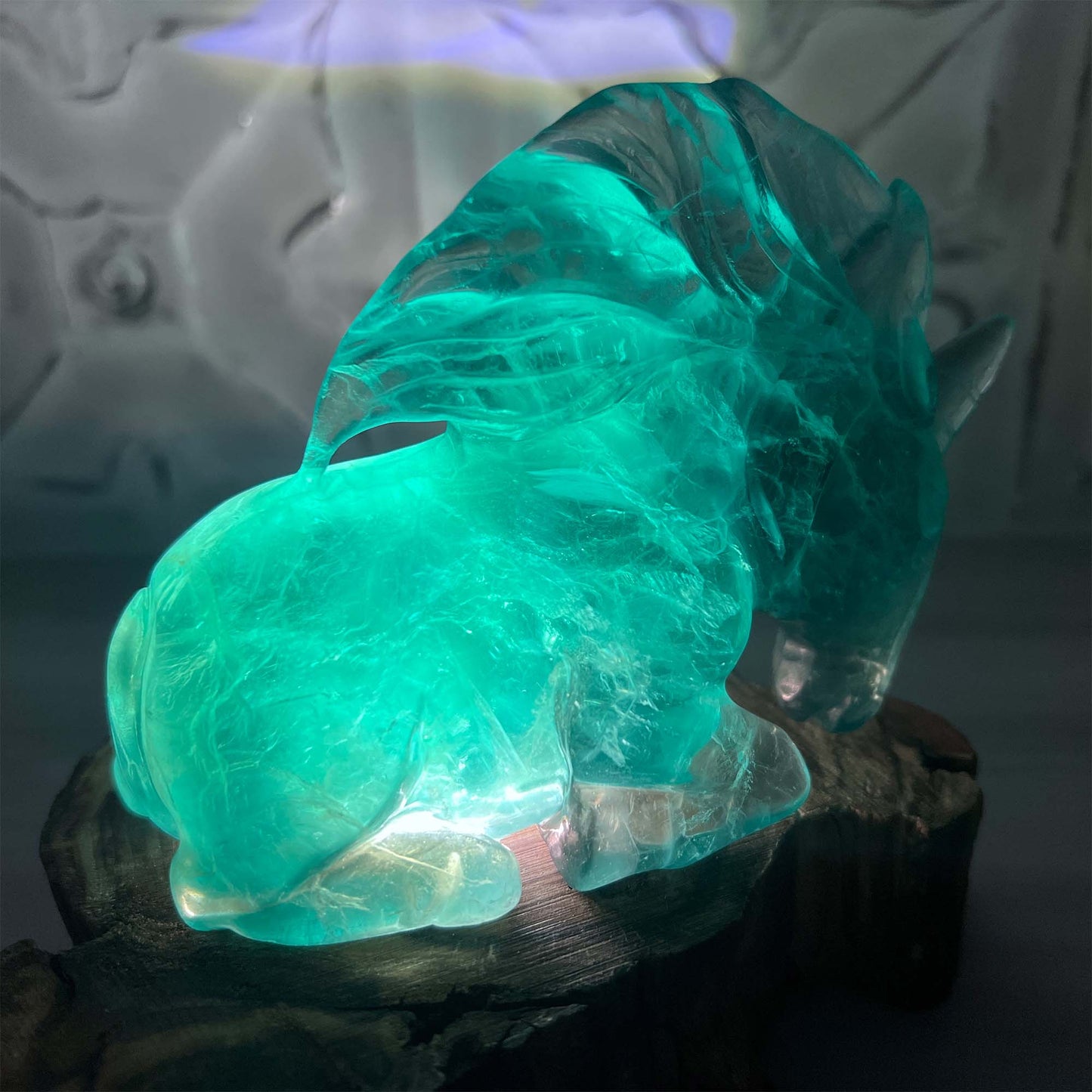 Polished Green Fluorite Unicorn Carving with Natural Wood Base