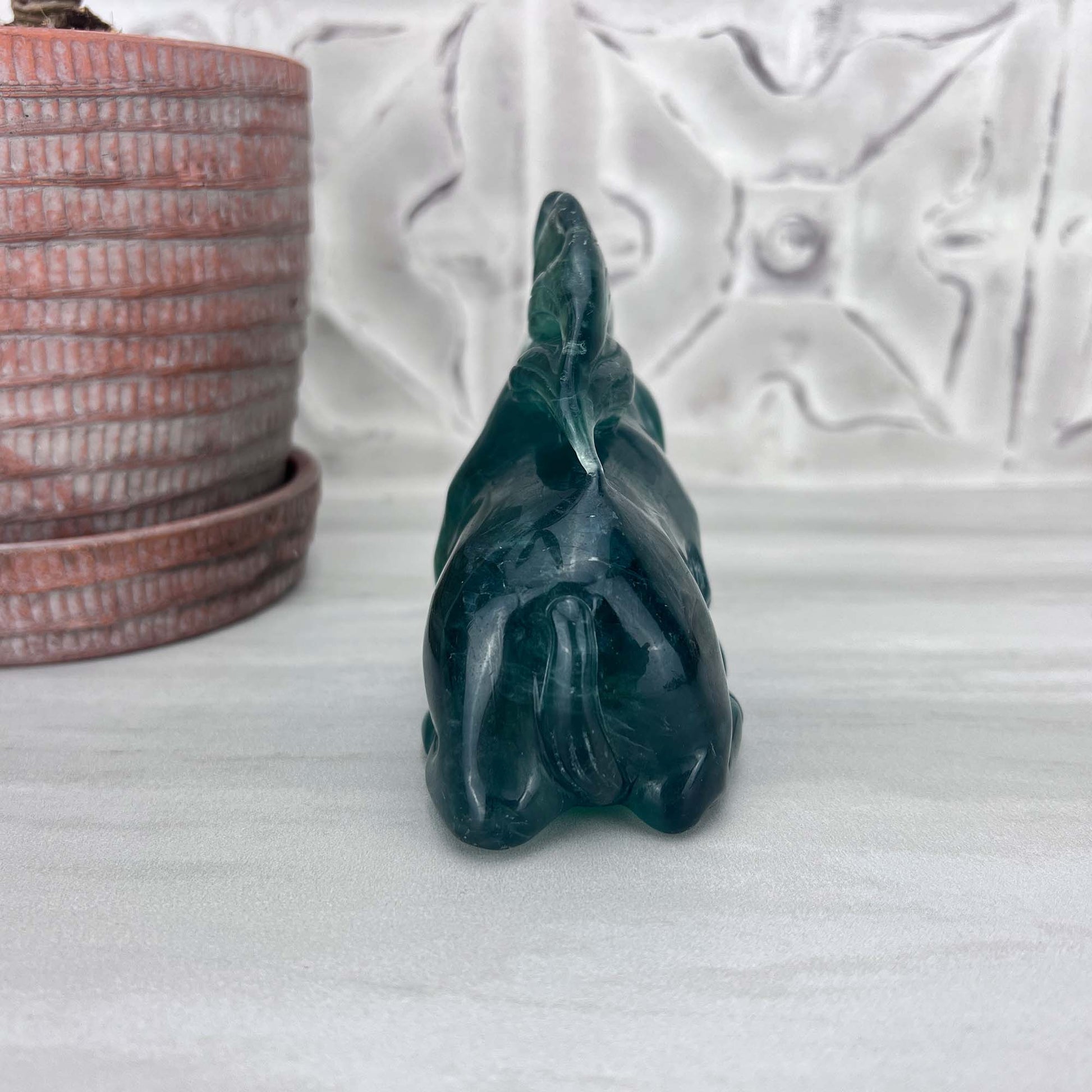 Polished Green Fluorite Unicorn Carving with Natural Wood Base