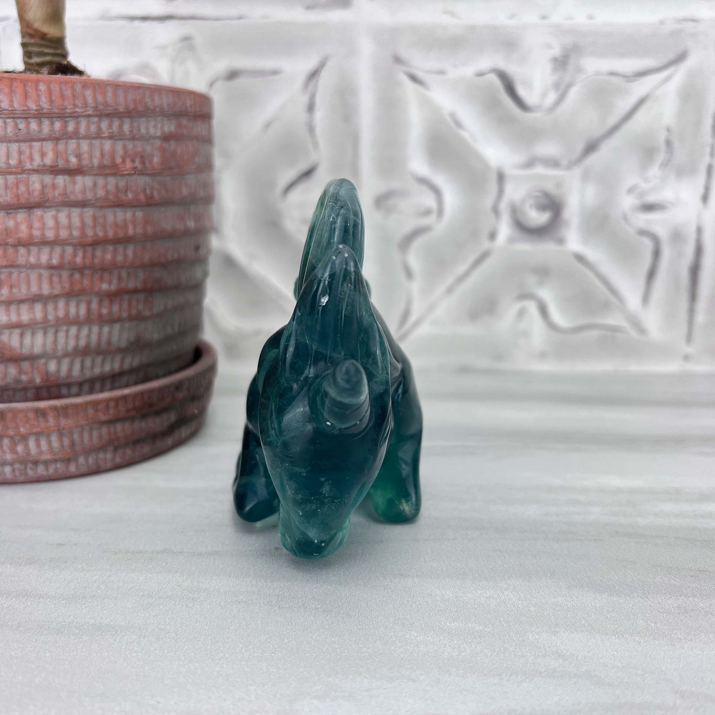 Polished Green Fluorite Unicorn Carving with Natural Wood Base