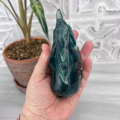 Polished Green Fluorite Unicorn Carving with Natural Wood Base