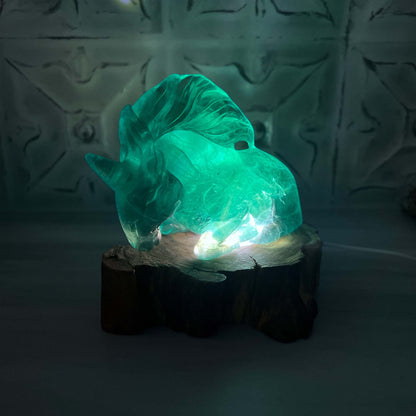 Polished Green Fluorite Unicorn Carving with Natural Wood Base