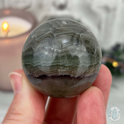 42mm Polished Green and Purple Fluorite Layered Sphere