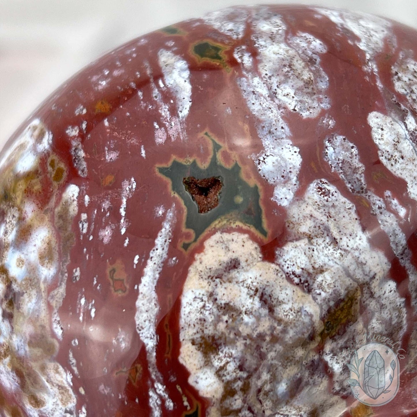 Red and White Ocean Jasper Skull Carving
