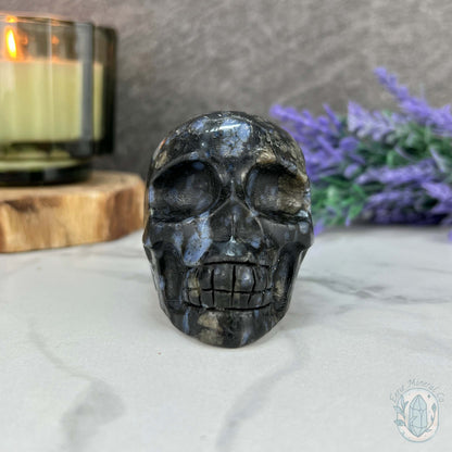 Que Sera with Blue Quartz Skull Carving