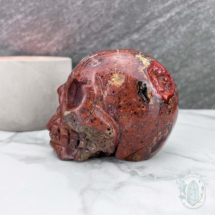 Polished Orrelanite Red Fox Agate Skull Carving