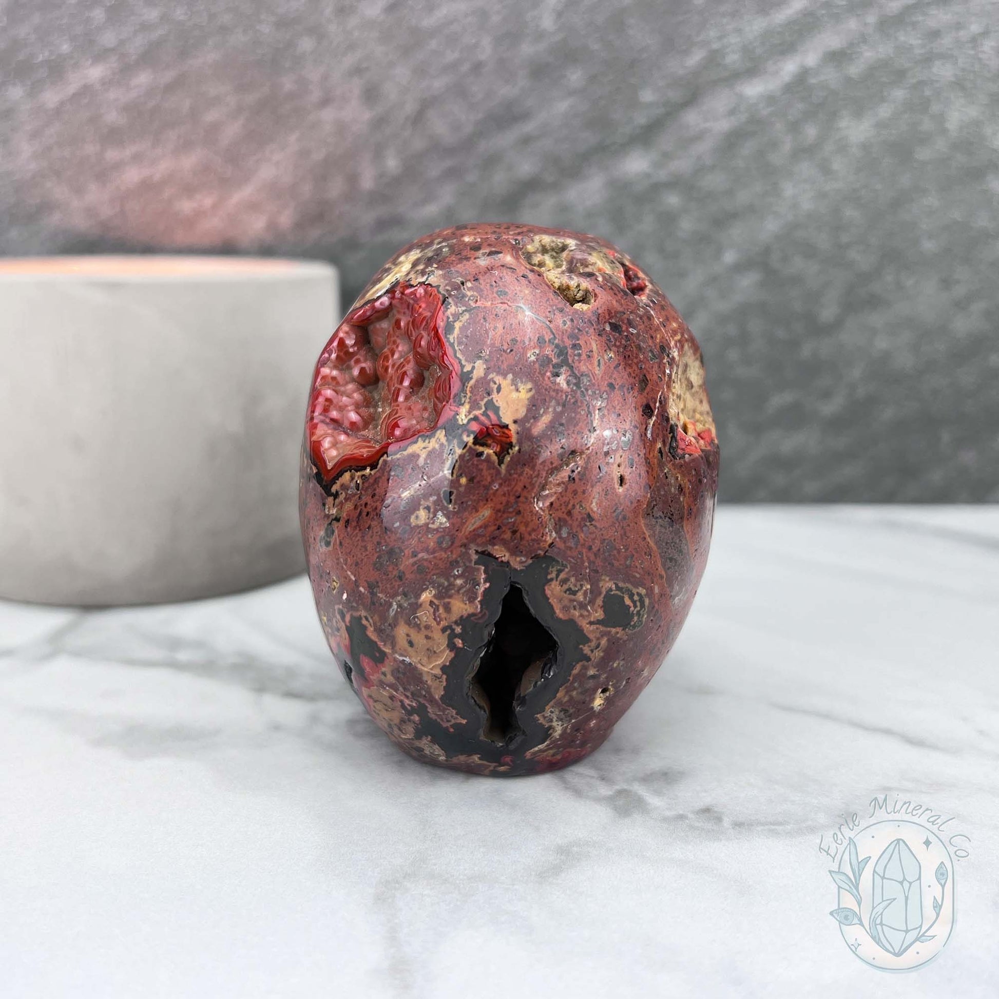 Polished Orrelanite Red Fox Agate Skull Carving