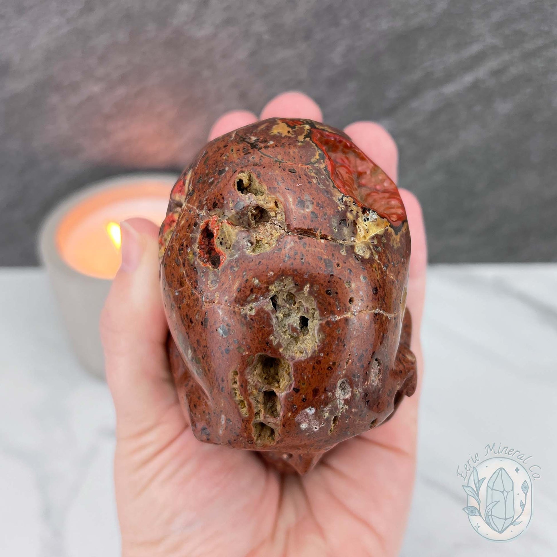 Polished Orrelanite Red Fox Agate Skull Carving