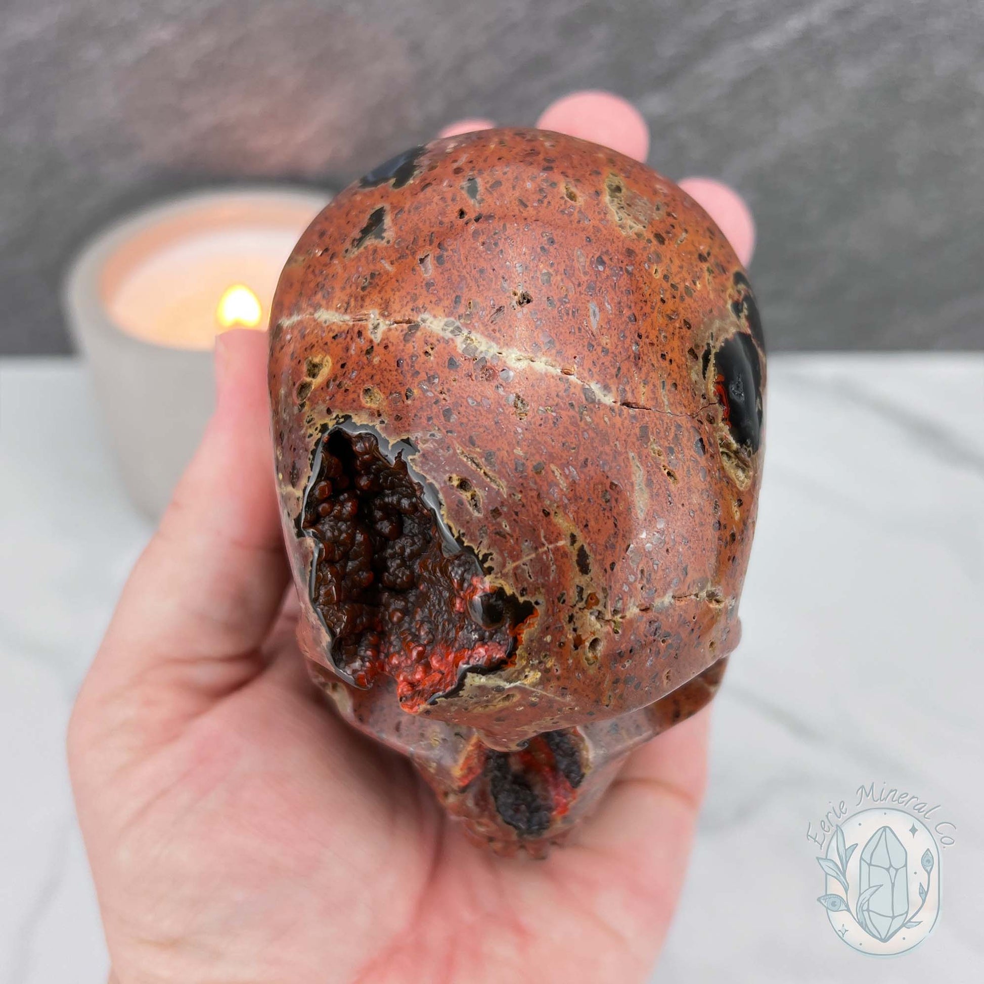 Polished Orrelanite Red Fox Agate Skull Carving