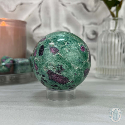 63mm Polished UV Reactive Ruby Fuschite Sphere