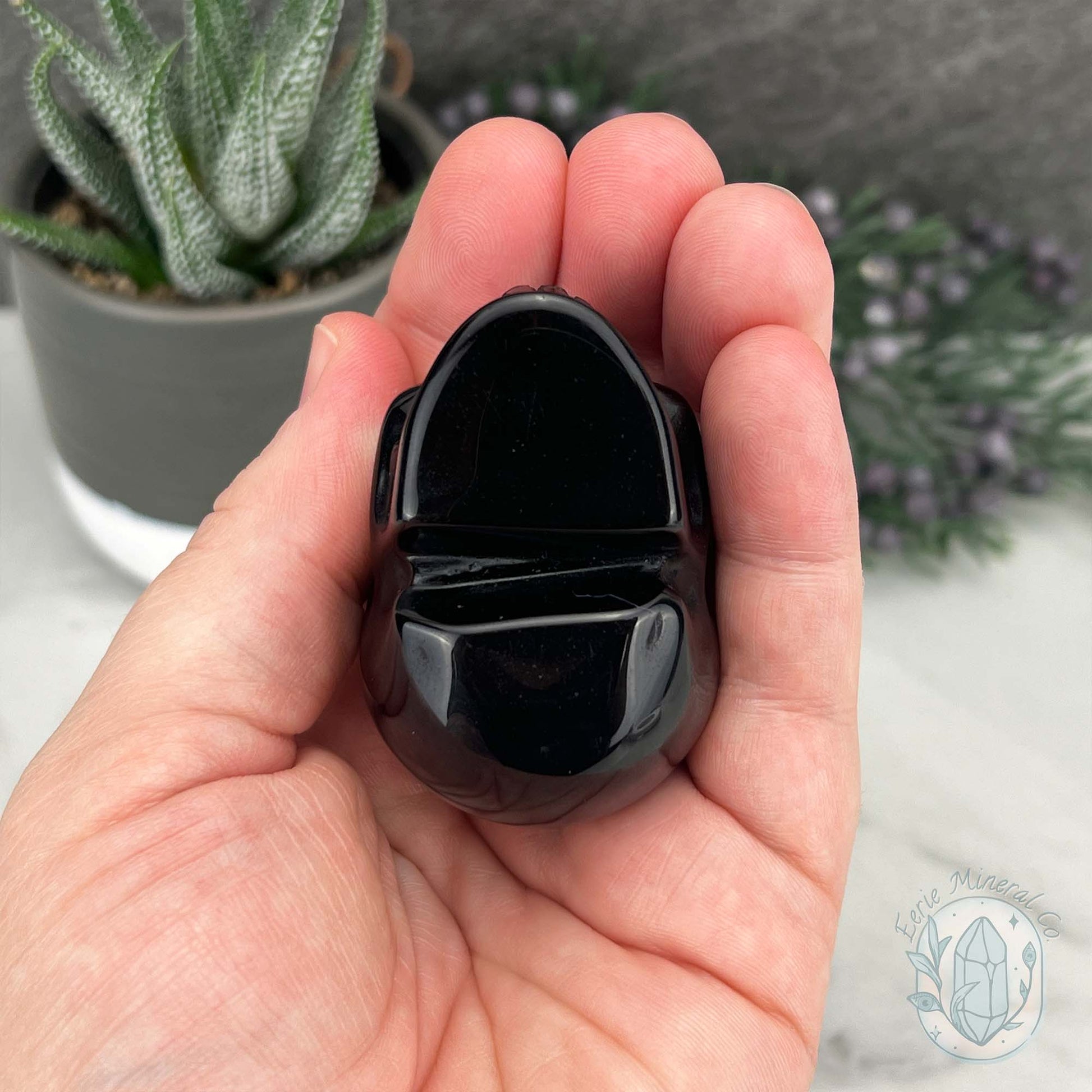 Polished Silver Obsidian Skull Carving