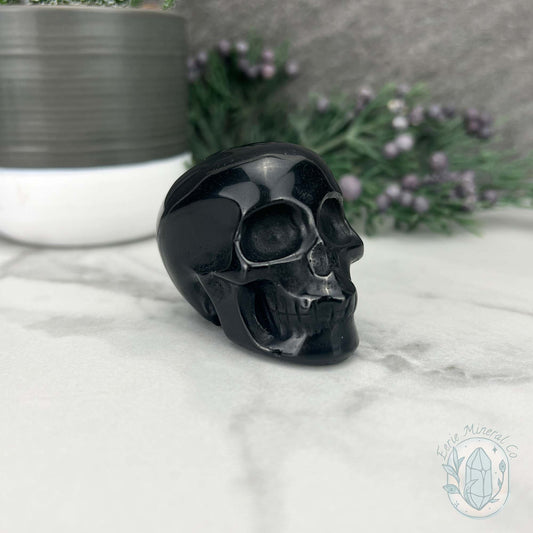 Polished Silver Sheen Obsidian Skull Carving