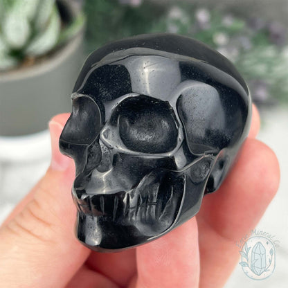 Polished Silver Sheen Obsidian Skull Carving