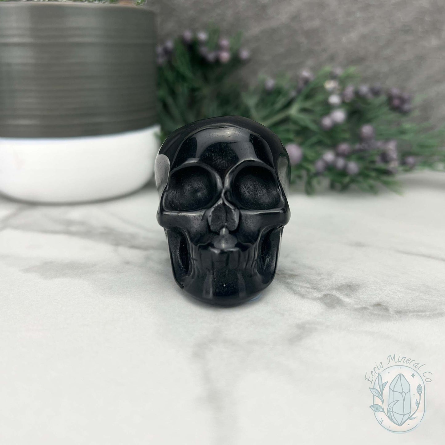Polished Silver Sheen Obsidian Skull Carving