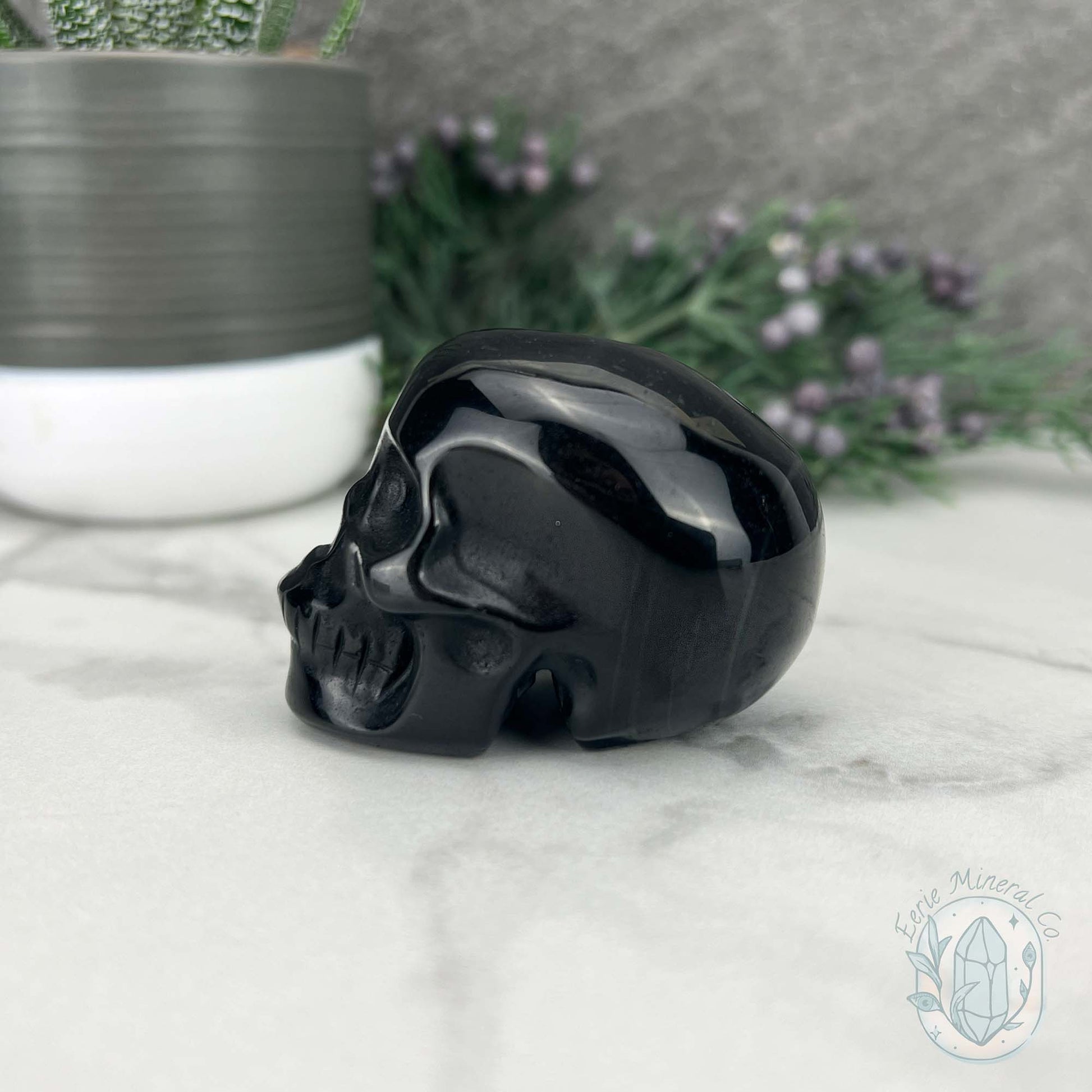Polished Silver Sheen Obsidian Skull Carving