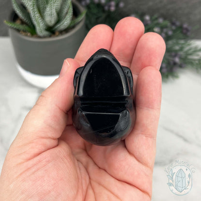 Polished Silver Sheen Obsidian Skull Carving