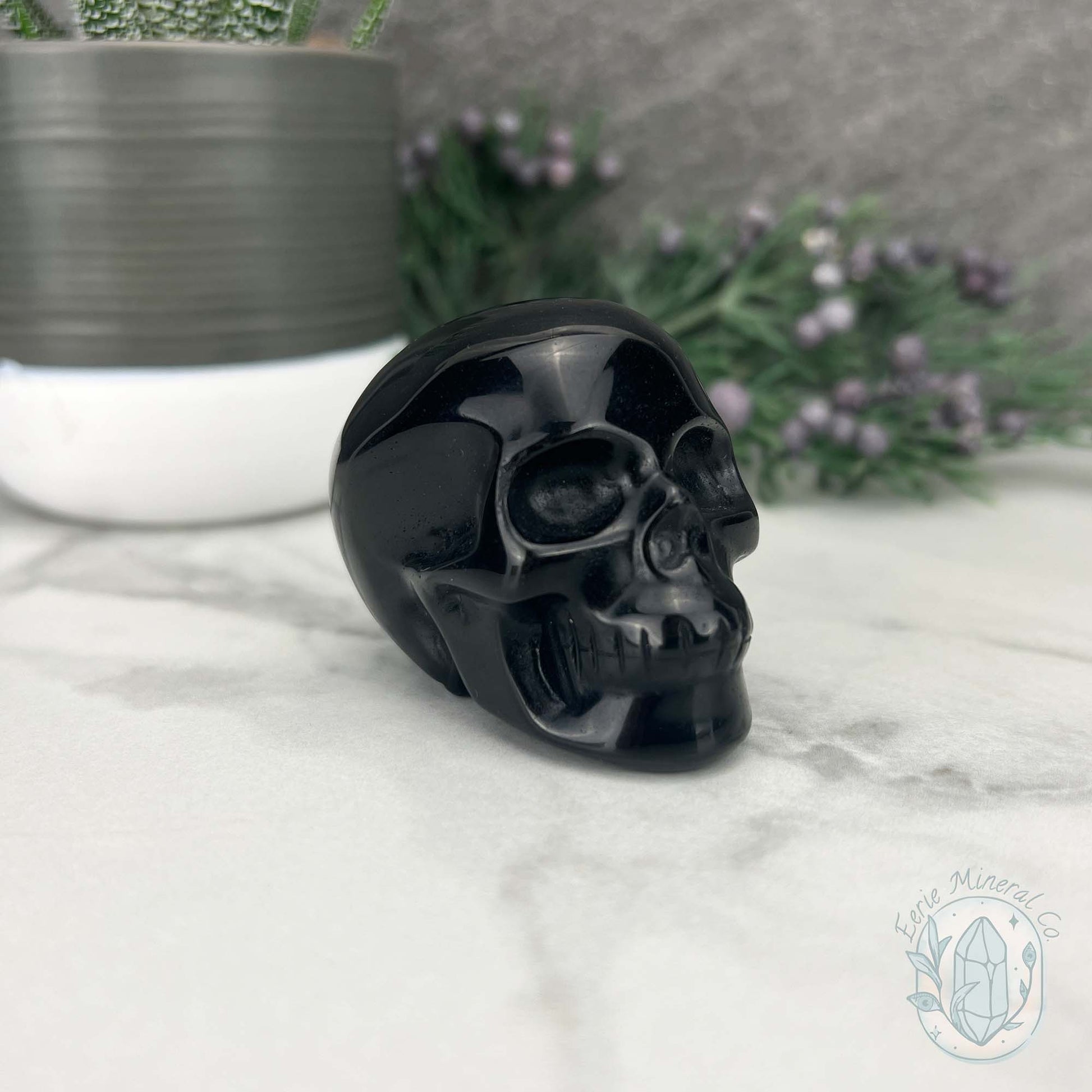 Polished Silver Sheen Obsidian Skull Carving