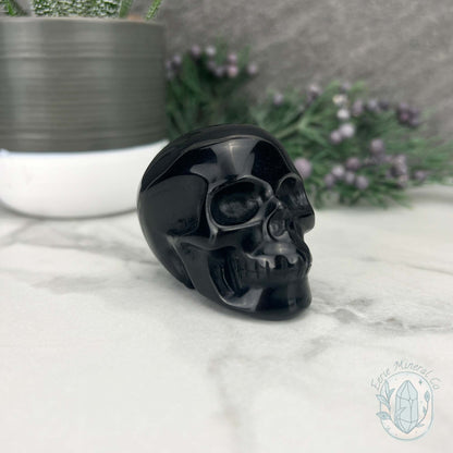 Polished Silver Sheen Obsidian Skull Carving