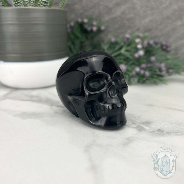 Polished Silver Sheen Obsidian Skull Carving