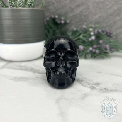Polished Silver Sheen Obsidian Skull Carving
