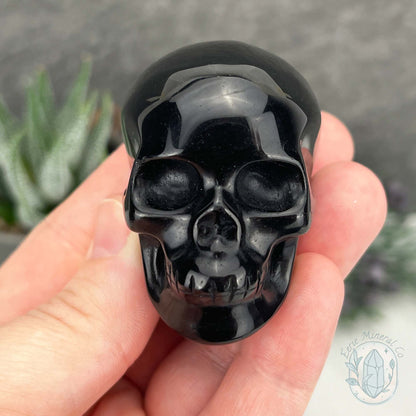 Polished Silver Sheen Obsidian Skull Carving