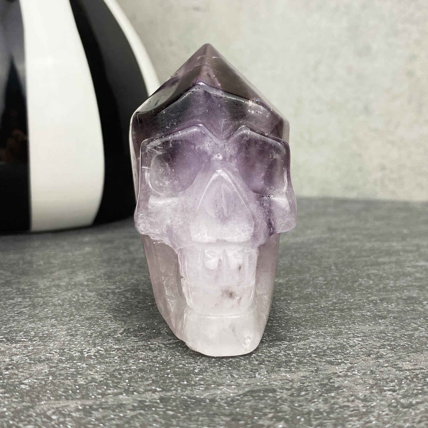 amethyst crystal point skull carving