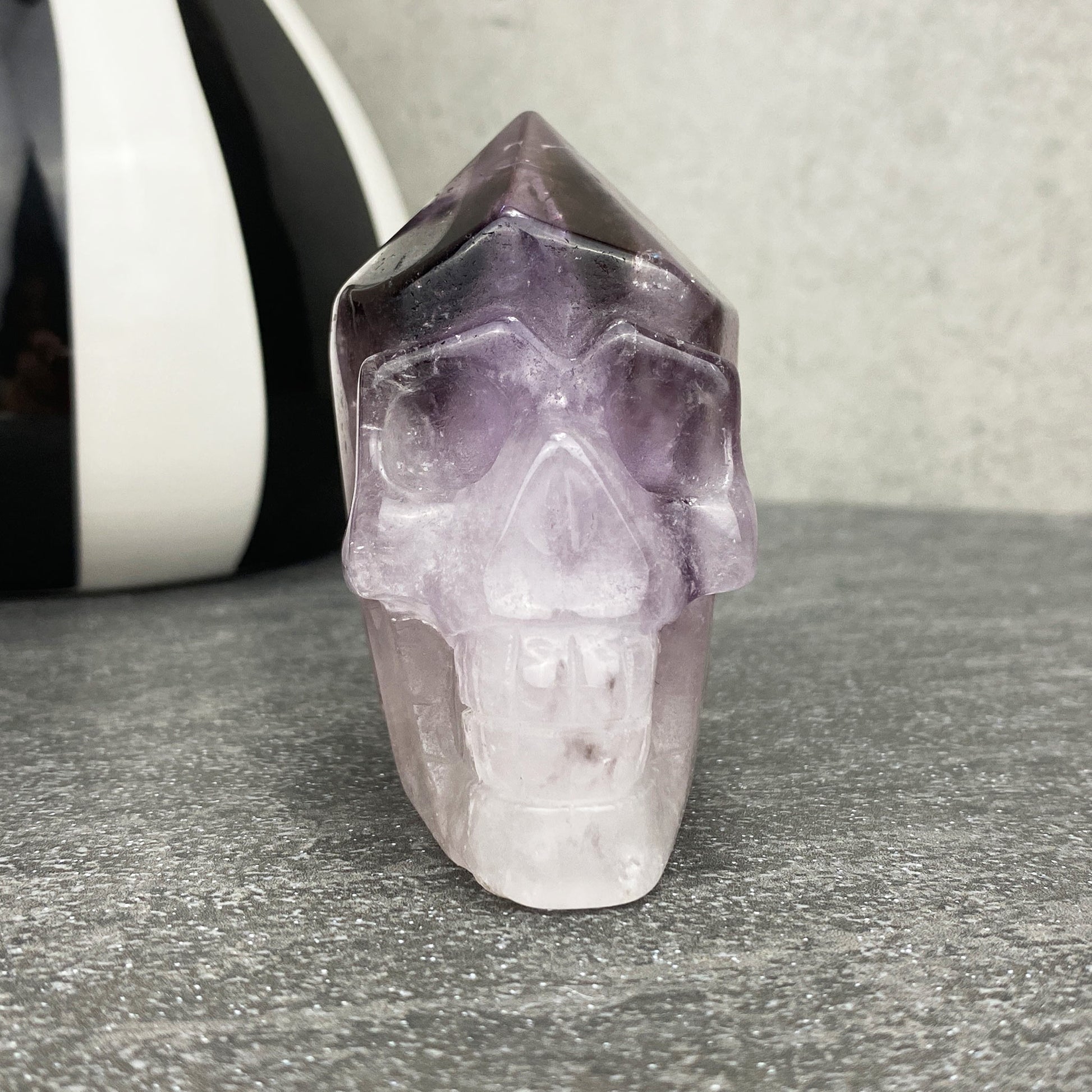 amethyst crystal point skull carving