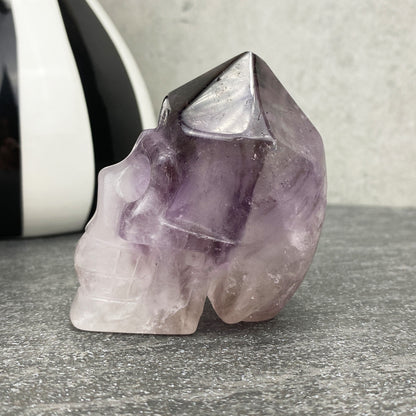 amethyst crystal point skull carving