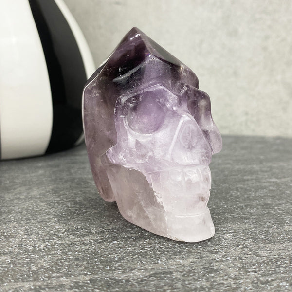 amethyst crystal point skull carving