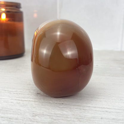 Polished Carnelian Skull Carving