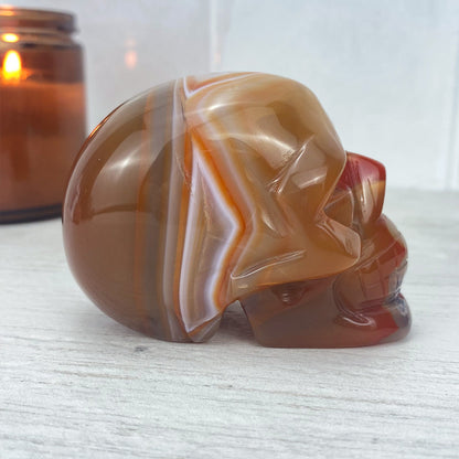 Polished Carnelian Skull Carving