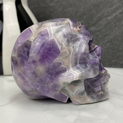Polished Chevron (Dream) Amethyst Crystal Skull Carving