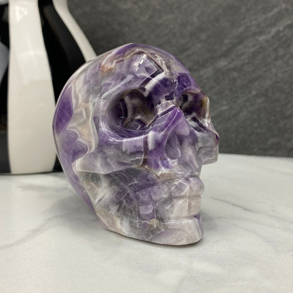 Polished Chevron (Dream) Amethyst Crystal Skull Carving