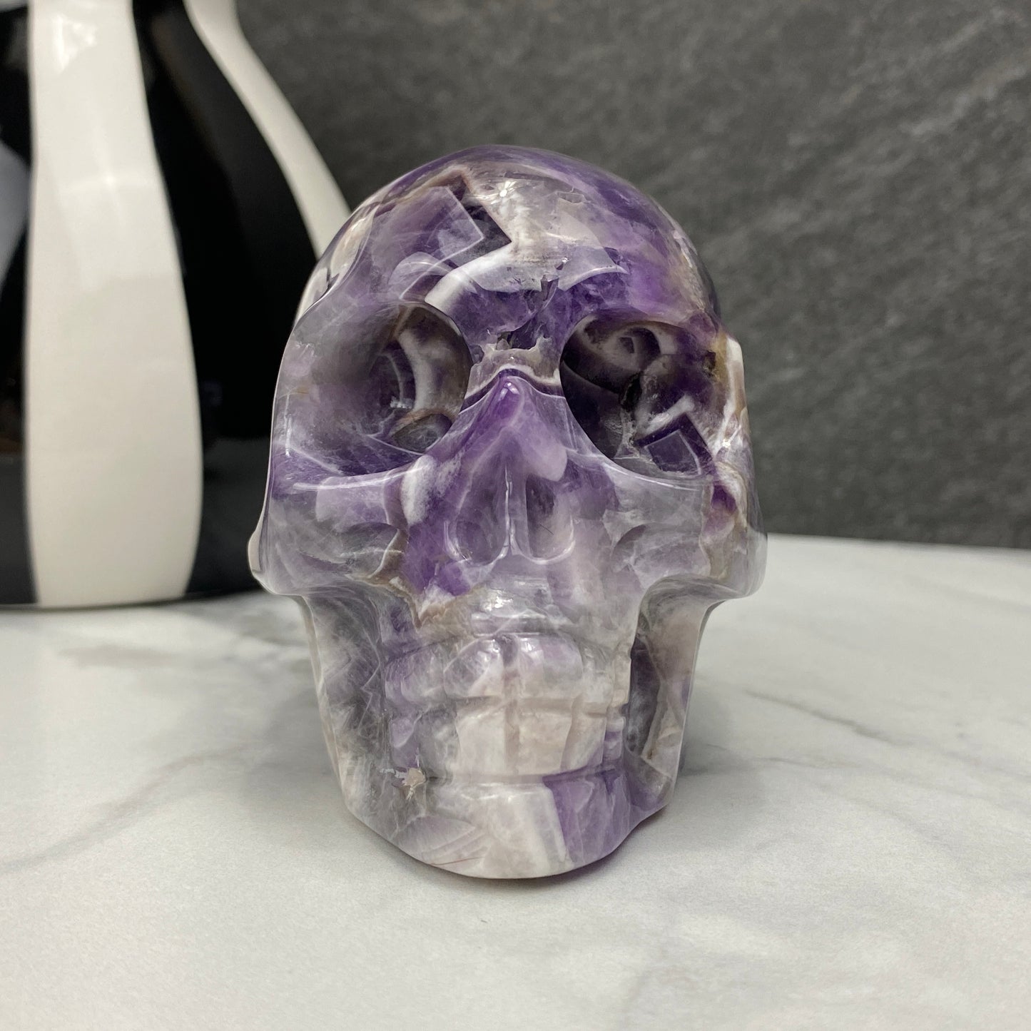 Polished Chevron (Dream) Amethyst Crystal Skull Carving