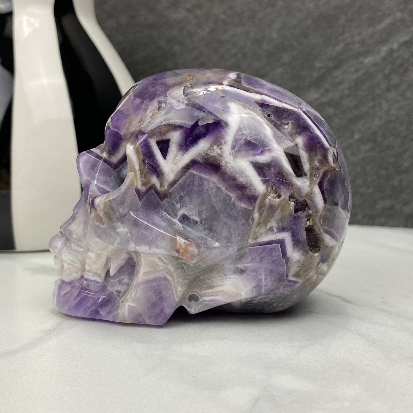 Polished Chevron (Dream) Amethyst Crystal Skull Carving