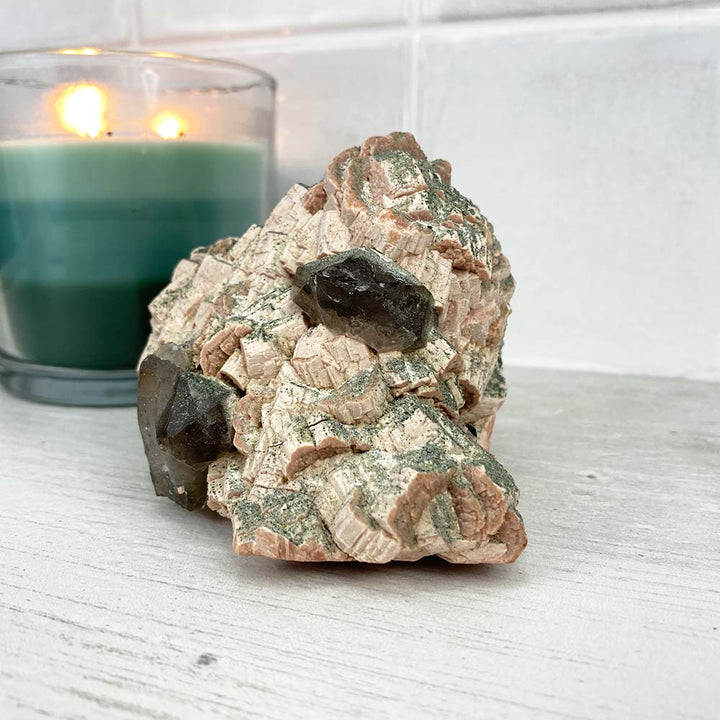 Pink Feldspar with Epidote and Smoky Quartz Hedgehog Carving