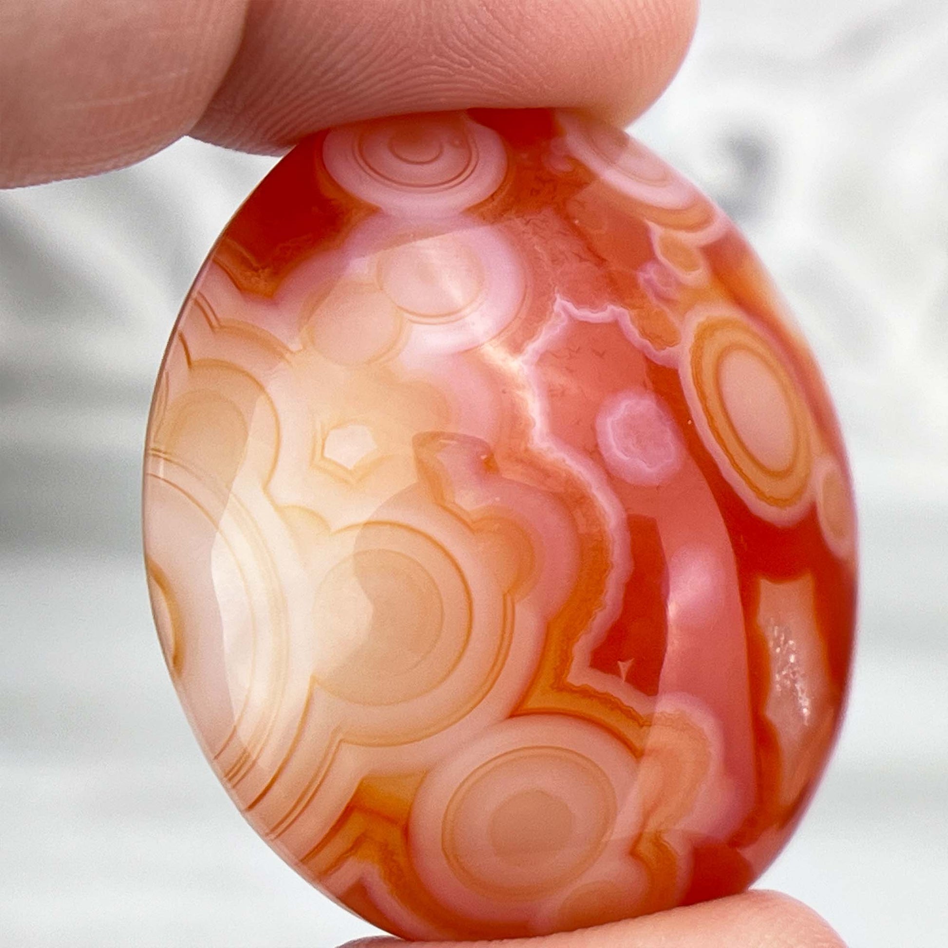 Polished Orange and White Gobi Desert Agate Cabochon