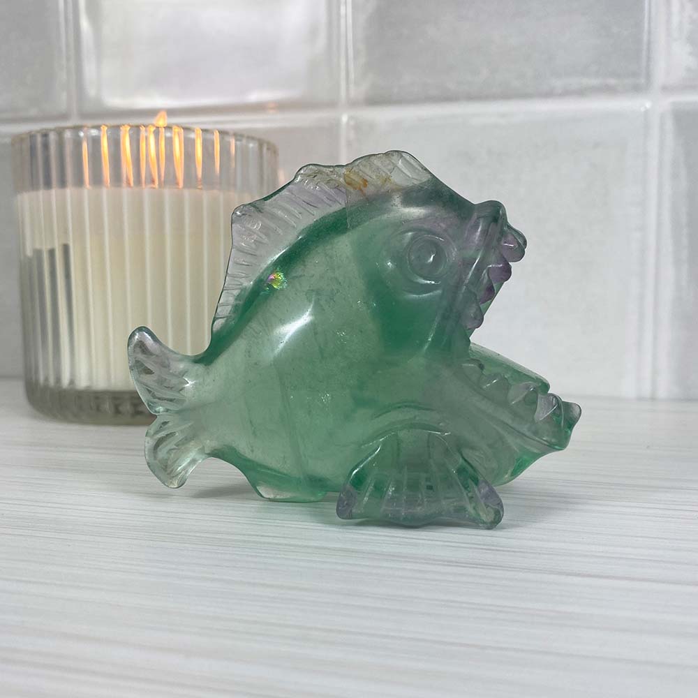 Polished Green and Purple Fluorite Piranha Carving