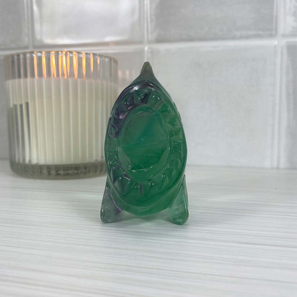 Polished Green and Purple Fluorite Piranha Carving
